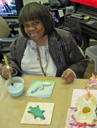 Odessa working on Glazing tiles for the Frederick Douglass Mural, installed at the NY Aquarium